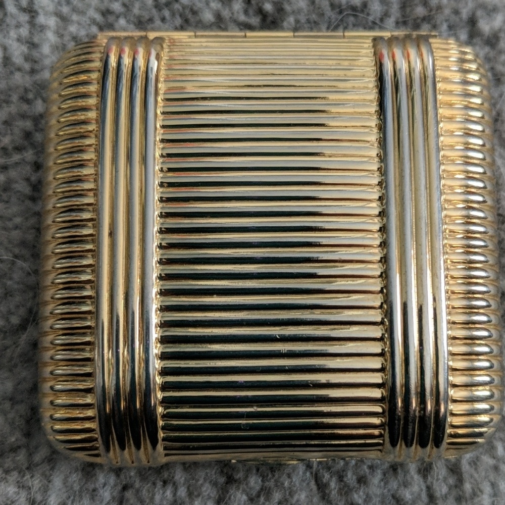 Brass make up compact
